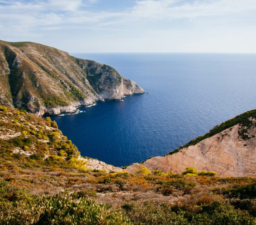 landscape of mountain near ocean